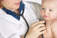 Doctor holding stethoscope to baby s chest an 6.jpg